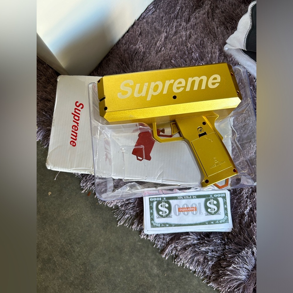 Supreme Gold Money gun in original box